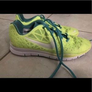 Nike shoes size 7 neon yellow and teal blue
